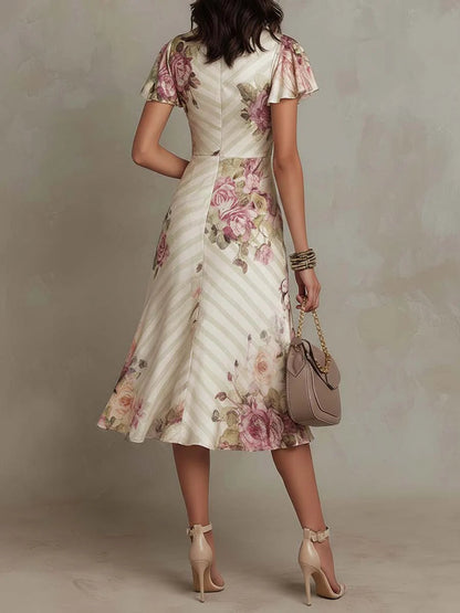Elegant Ivory Floral Midi Dress for Women with V Neck Flutter Sleeve Ruched Wrap Flowing Style