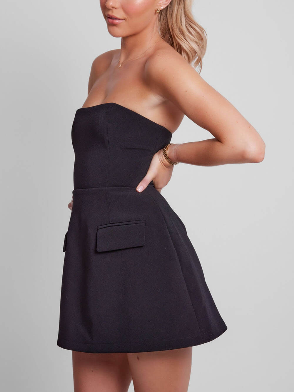 Elegant Structured Mini Dress for Women with Strapless Fit and Flare Flap Pocket Cocktail Style