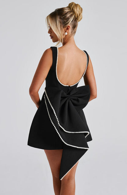 Elegant Pearl Trim Bow Mini Dress for Women with Boat Neck Sleeveless Fit and Flare Cocktail Style