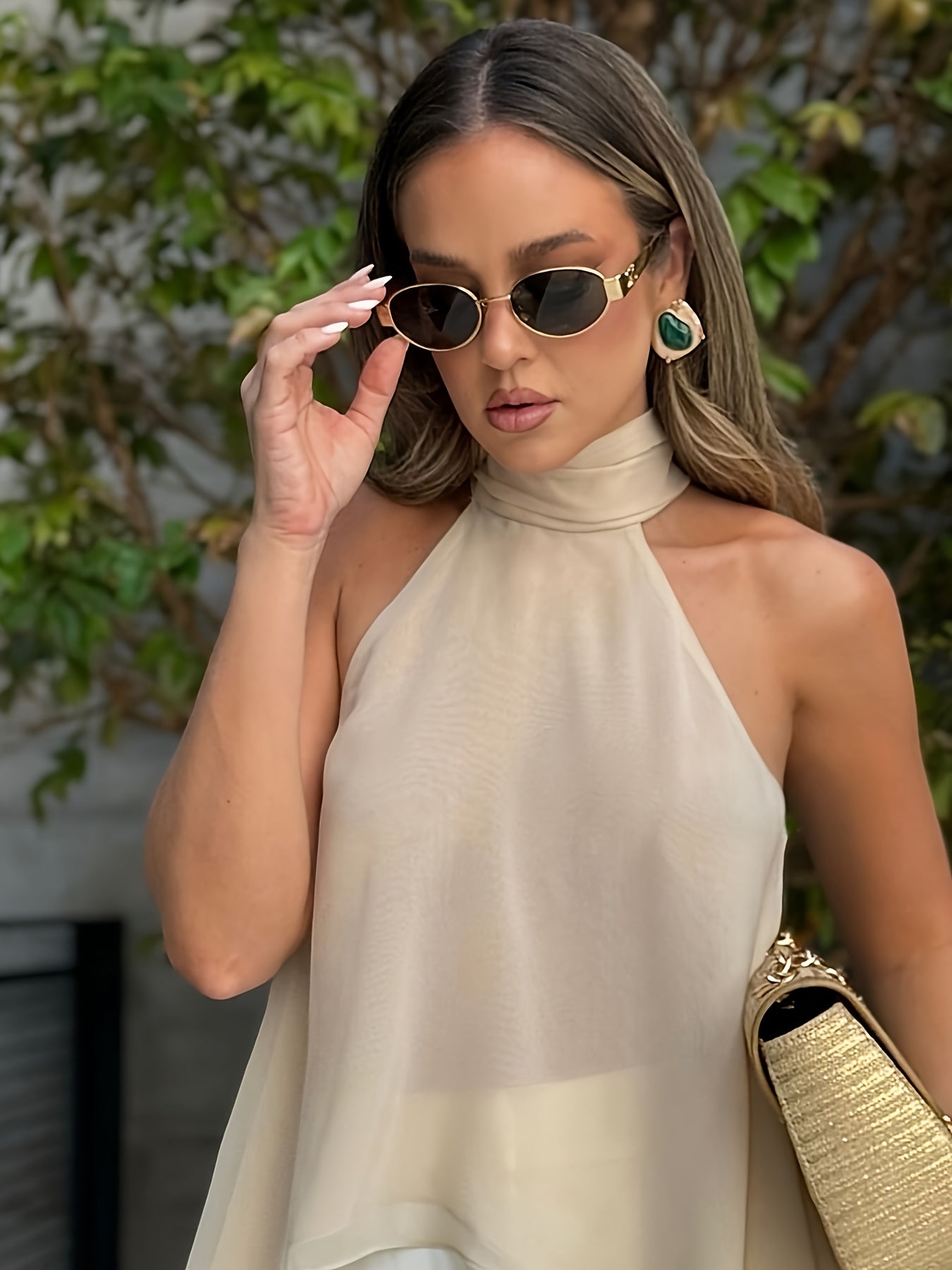 Effortless Chiffon Halter Blouse for Women with High Neck Sleeveless Asymmetric Hem Flowing Style