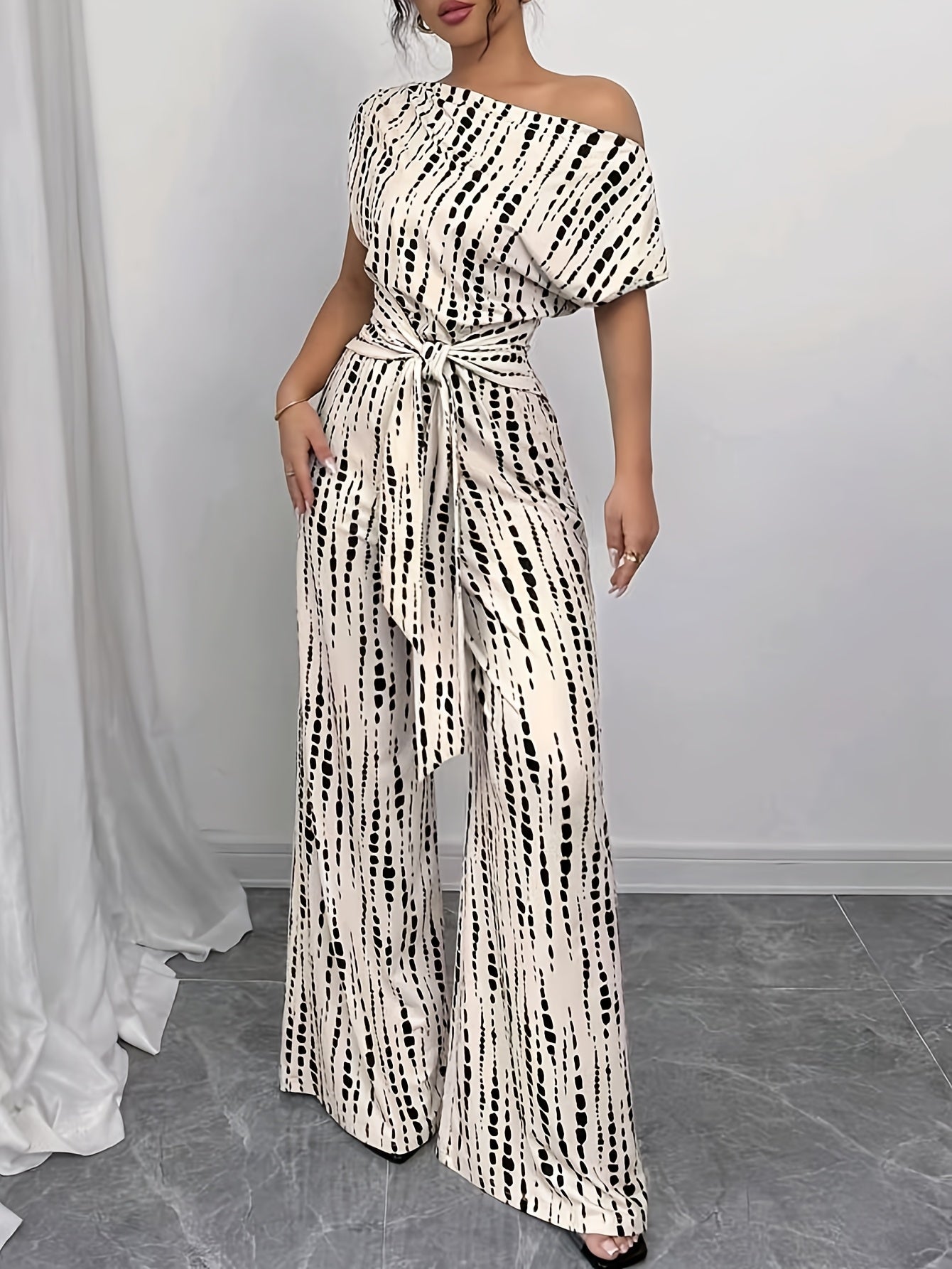Elegant Apricot Printed Jumpsuit for Women with One Shoulder Short Sleeve Tie Waist Wide Leg Flowing Style