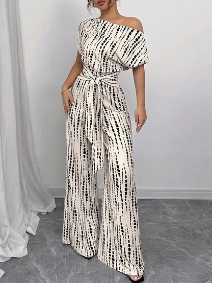 Elegant Apricot Printed Jumpsuit for Women with One Shoulder Short Sleeve Tie Waist Wide Leg Flowing Style