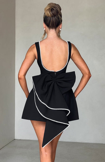 Elegant Pearl Trim Bow Mini Dress for Women with Boat Neck Sleeveless Fit and Flare Cocktail Style