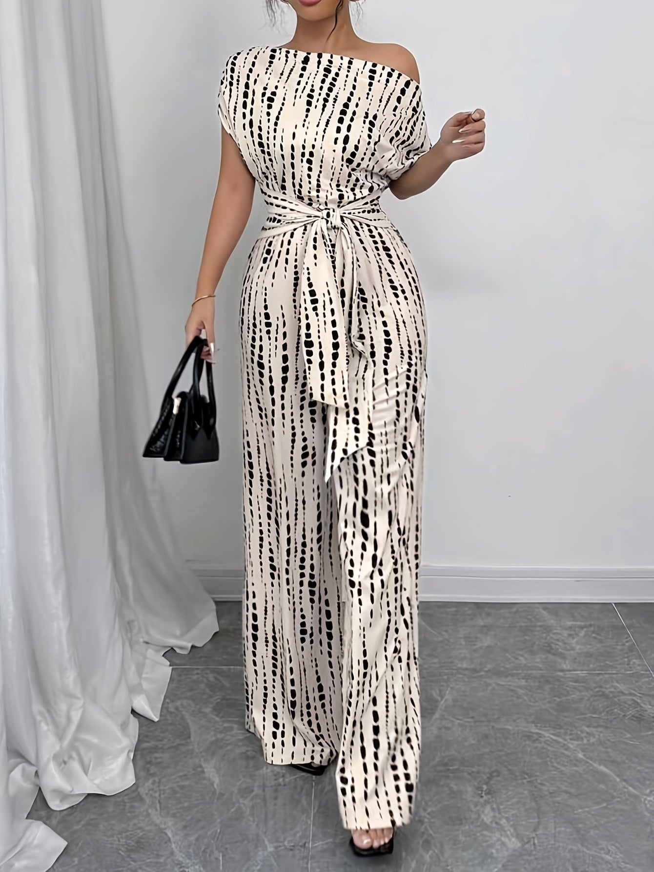 Elegant Apricot Printed Jumpsuit for Women with One Shoulder Short Sleeve Tie Waist Wide Leg Flowing Style