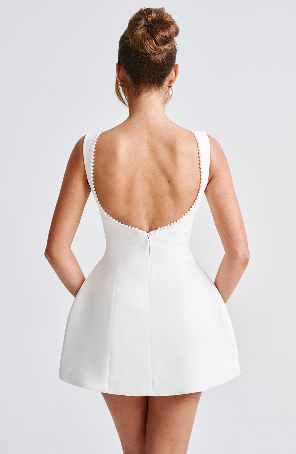 Elegant Pearl Trim Bow Mini Dress for Women with Boat Neck Sleeveless Fit and Flare Cocktail Style