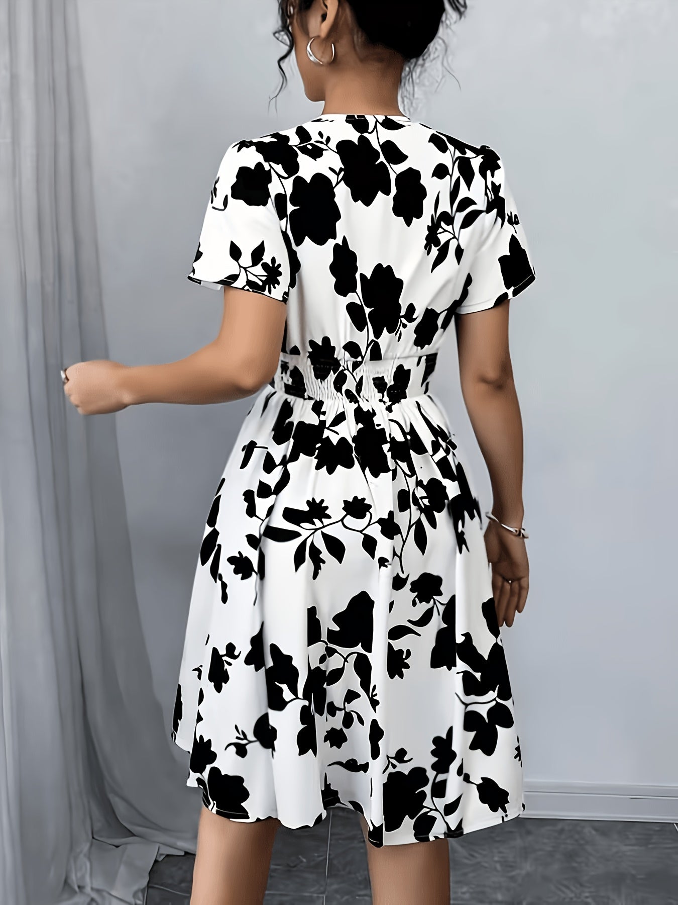 Elegant White Floral Midi Dress for Women with V Neck Flutter Sleeve Wrap Fit and Flare Style