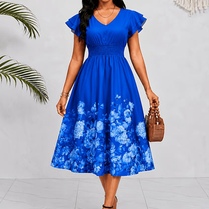 Mediterranean Style Royal Blue Floral Printed Dress with Flutter Sleeves, V-Neck, Cinched Waist, And a Flowing Skirt Perfect for Vacations
