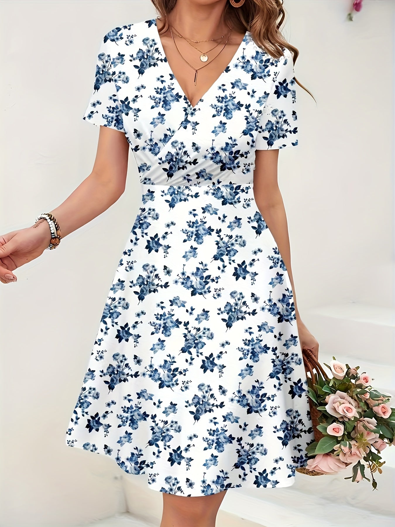 Effortless Blue Floral Midi Dress for Women with V Neck Flutter Sleeve Wrap Fit and Flare Style