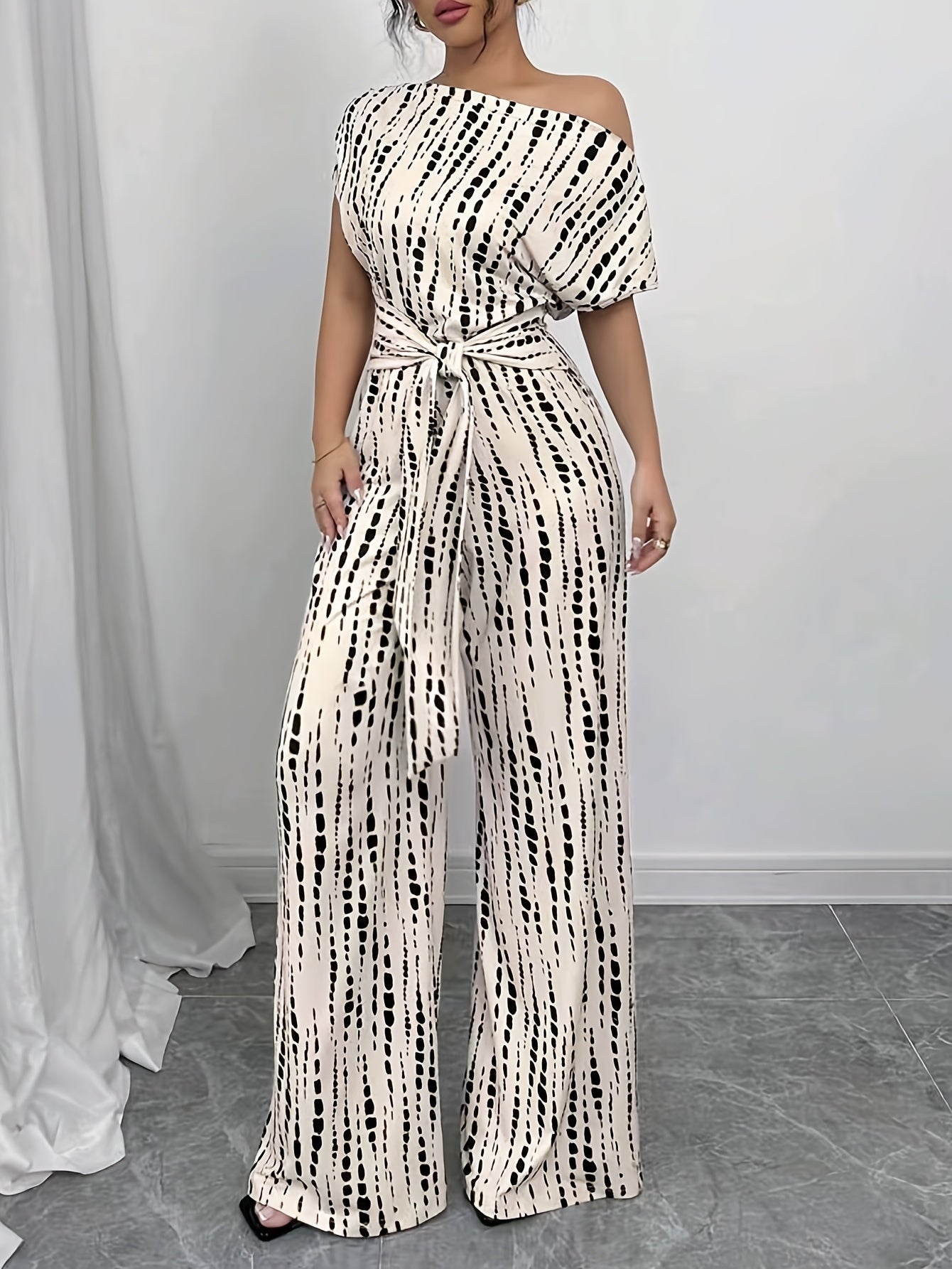 Elegant Apricot Printed Jumpsuit for Women with One Shoulder Short Sleeve Tie Waist Wide Leg Flowing Style