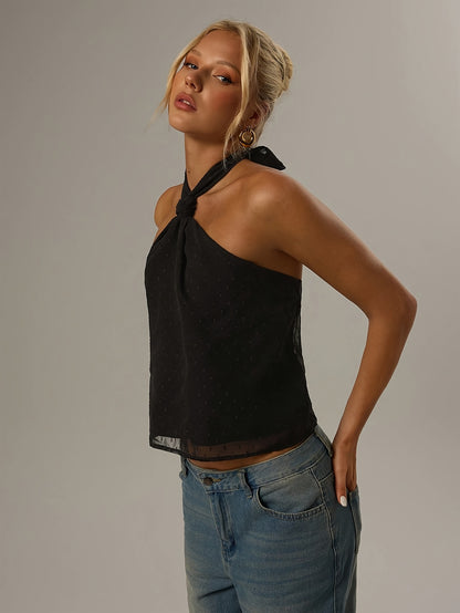 Effortless Black Swiss Dot Blouse for Women with Halter Neck Backless Bow Tie Flowing Tank Style