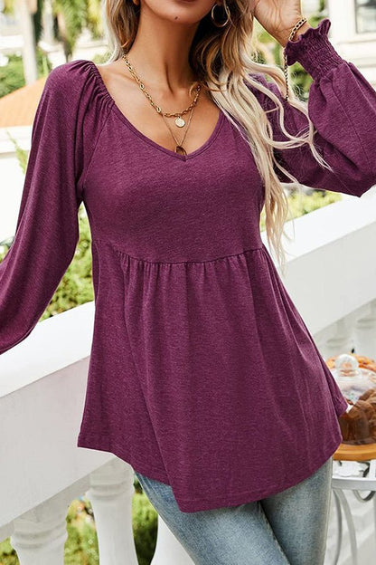Effortless Knit Peplum Blouse for Women with V Neck Long Sleeve Smocked Cuff Flowing Style